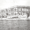 View from the sea of the burnt shell of Ciragan Palace and the main waterront gate, 1976